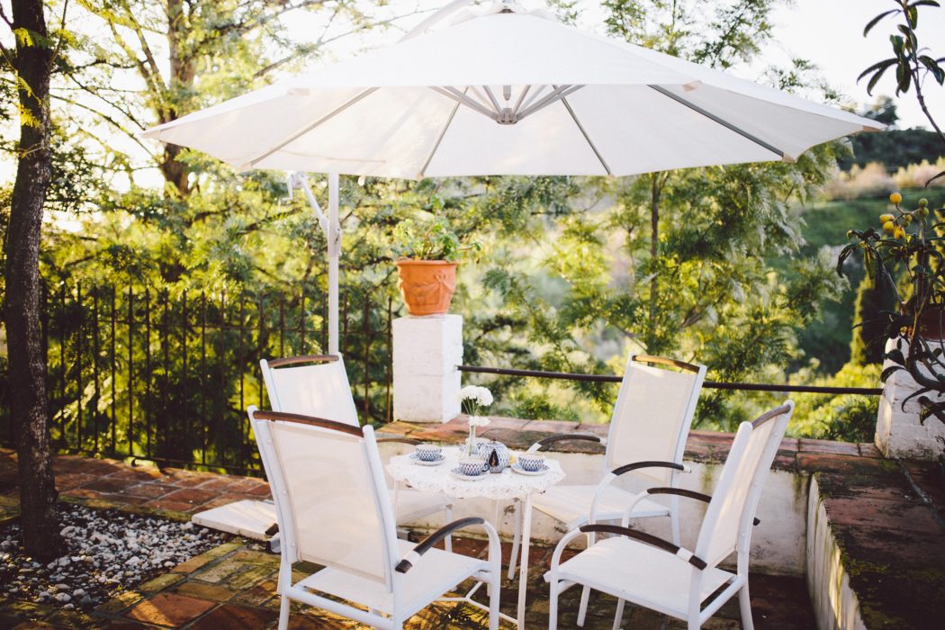 Outdoor seating area for breakfast in the morning sun in a Spanish Villa Holiday home