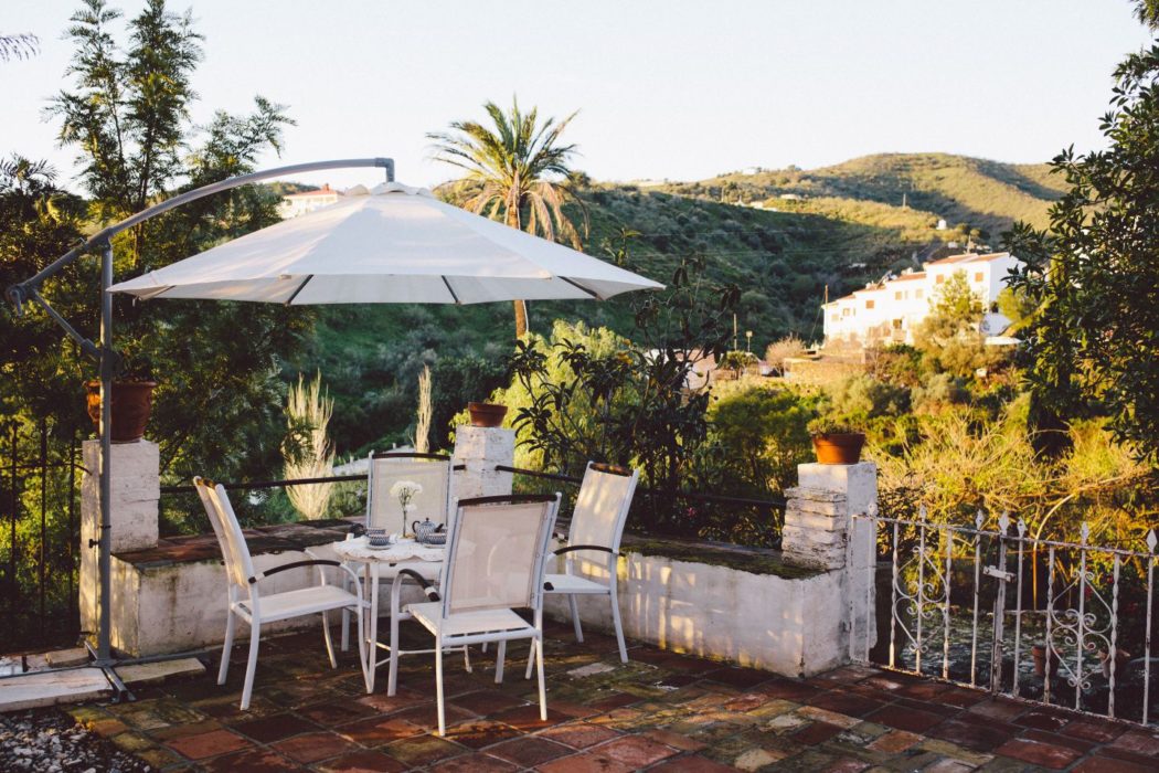 Dining outdoors on the terrace of a traditional Spain villa near Malaga